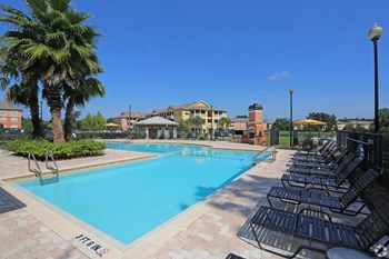 Resort style swimming pool with community view at The Columns at Cypress Point, 4330 Point Cypress Blvd, Wesley Chapel, 33545